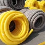 Drainage pipe with synthetic filter