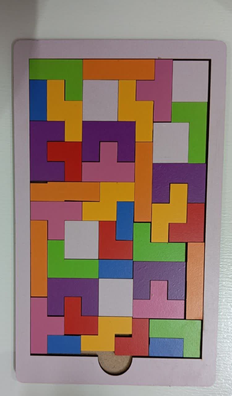 The Katamino game is a brain game for ages 3 and up, a mind-challenging game in the form of a puzzle with geometric shapes.   Different modes can be played. This game consists of wooden pieces in different shapes, sizes, and colors.